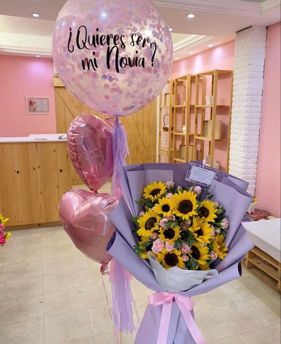 Bouquet de 20 Rosas y 10 Girasoles más Globo Burbuja (Personaliza tu frase)